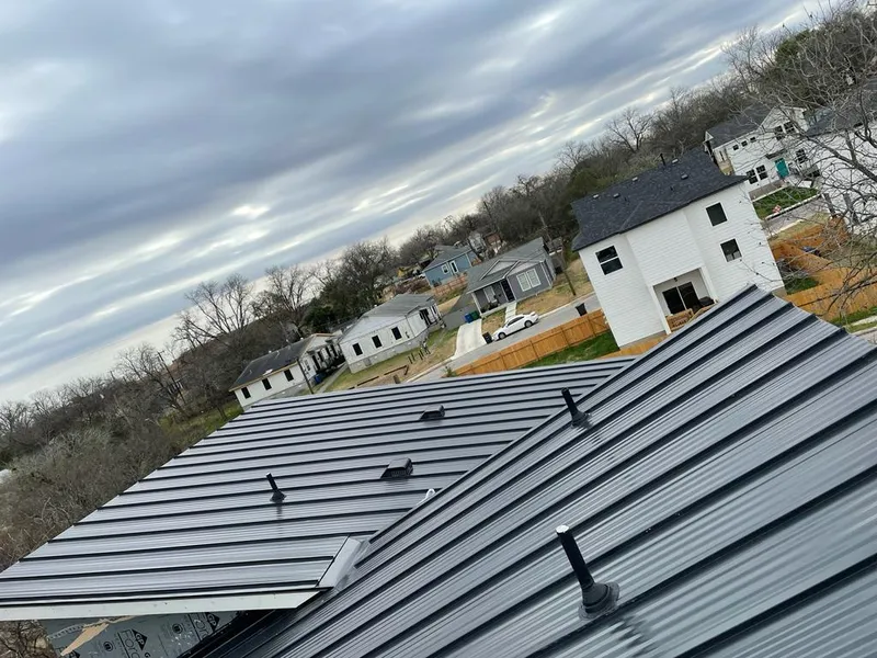 Standing seam metal roof panels with vents for Skylight Repair in Somerville